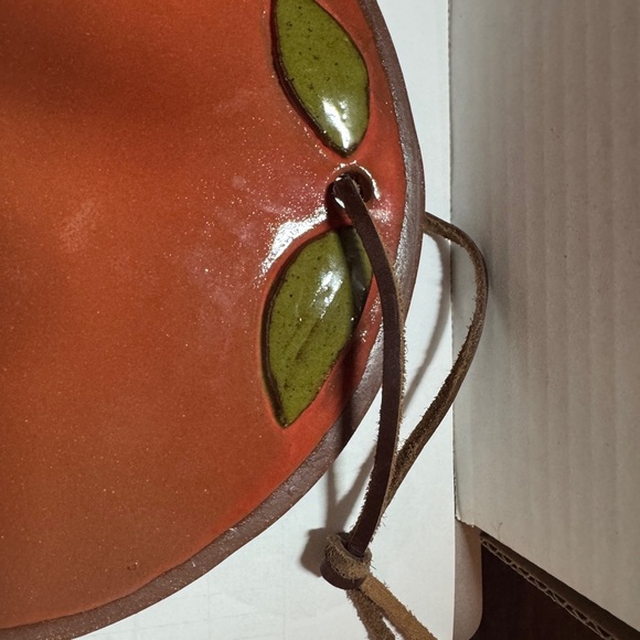 Handcrafted 8” pottery tomato hot plate/cutting board - Picture 2 of 3